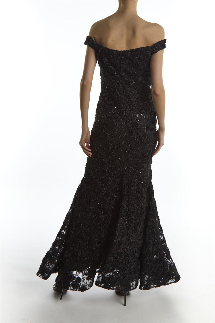 Black off-shoulder lace gown on a white background
