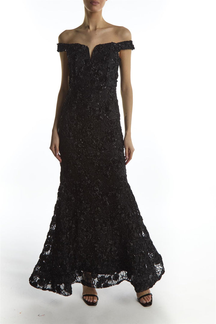 Black off-shoulder evening gown on a white background